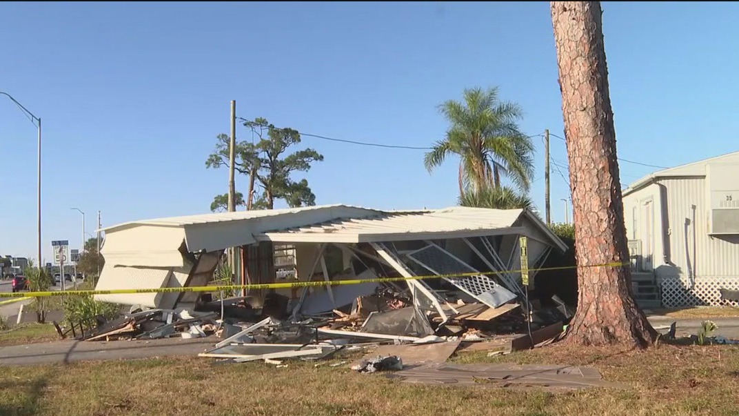 Car crashes into mobile home