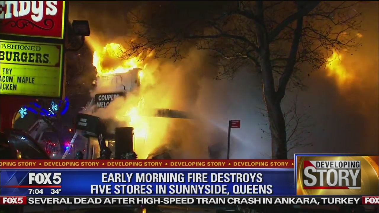 Fire rips through several stores in Queens