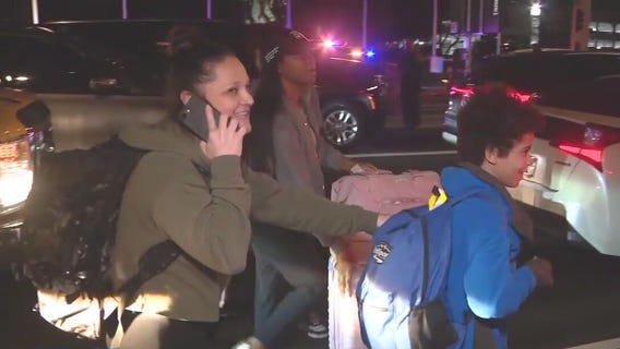 Travelers stuck in traffic ditch car, walk to LAX