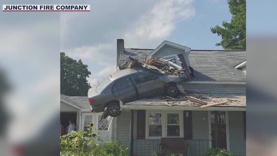 Car crashes into 2nd story of home