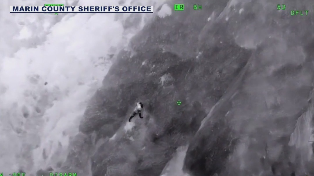 Man found clinging to cliff rescued