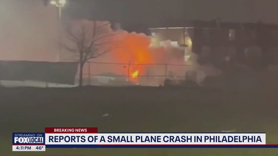 Philadelphia plane crash: Cars, homes on fire