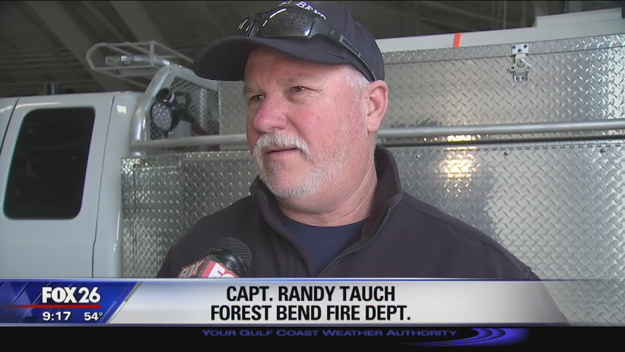 Houston-area firefighters return from Calif.