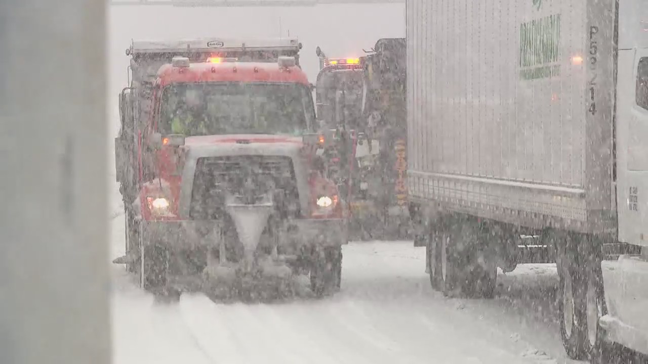 Spring snow descends on metro Detroit