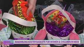 Assembling Easter baskets for women and children in need