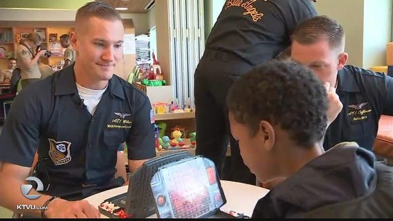 Marines take time out of Fleet Week to visit sick children in hospital