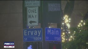 Dallas shooting suspect turns himself in amid murder investigation