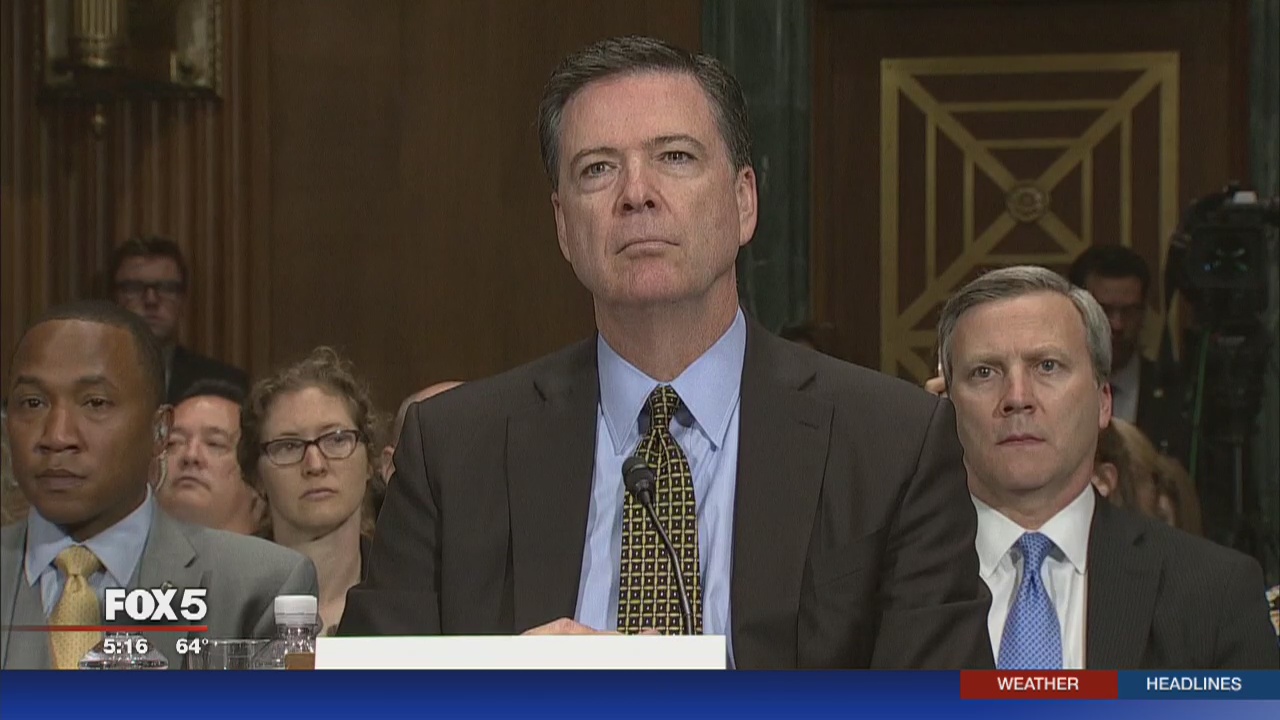 FBI director defends decision to reopen Clinton email probe