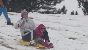 Chicago area families hit the sledding hills after snowfall