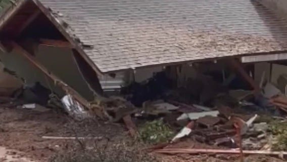 La Ca�ada Flintridge homes damaged by mudslide with more rain on the way