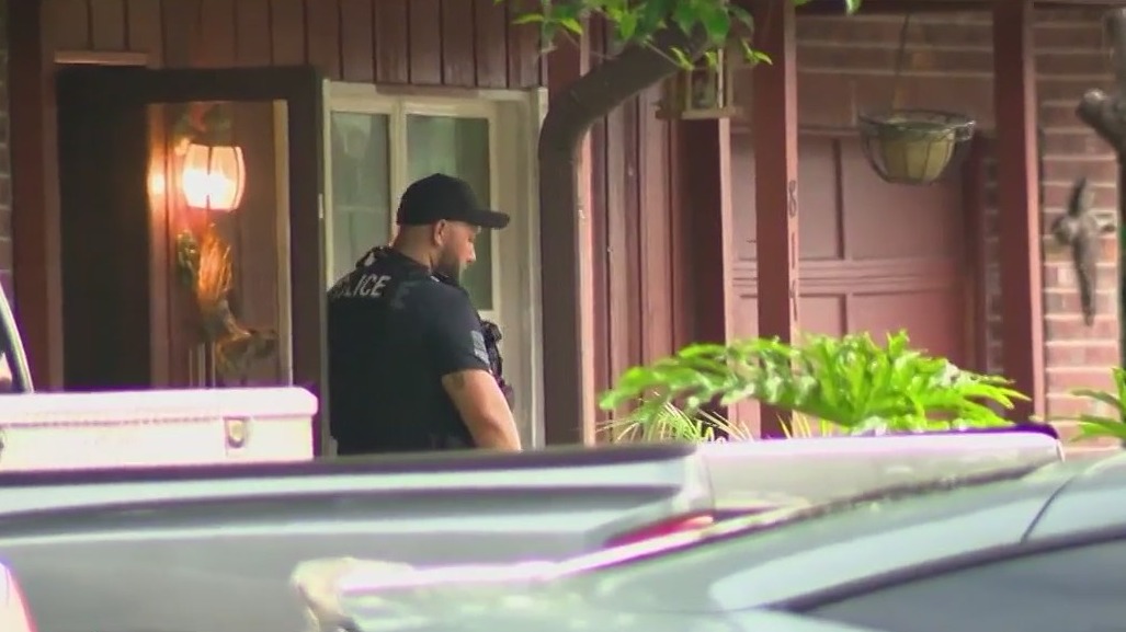 Neighbors cheer following SWAT raid arrests