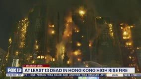 13 people killed in fire engulfing Hong Kong high-rise