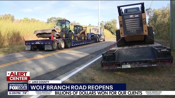 Wolf Branch Road reopens after washout from flooding