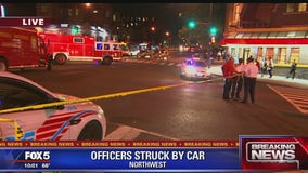 2 DC police officers, DPW employee struck by pickup truck