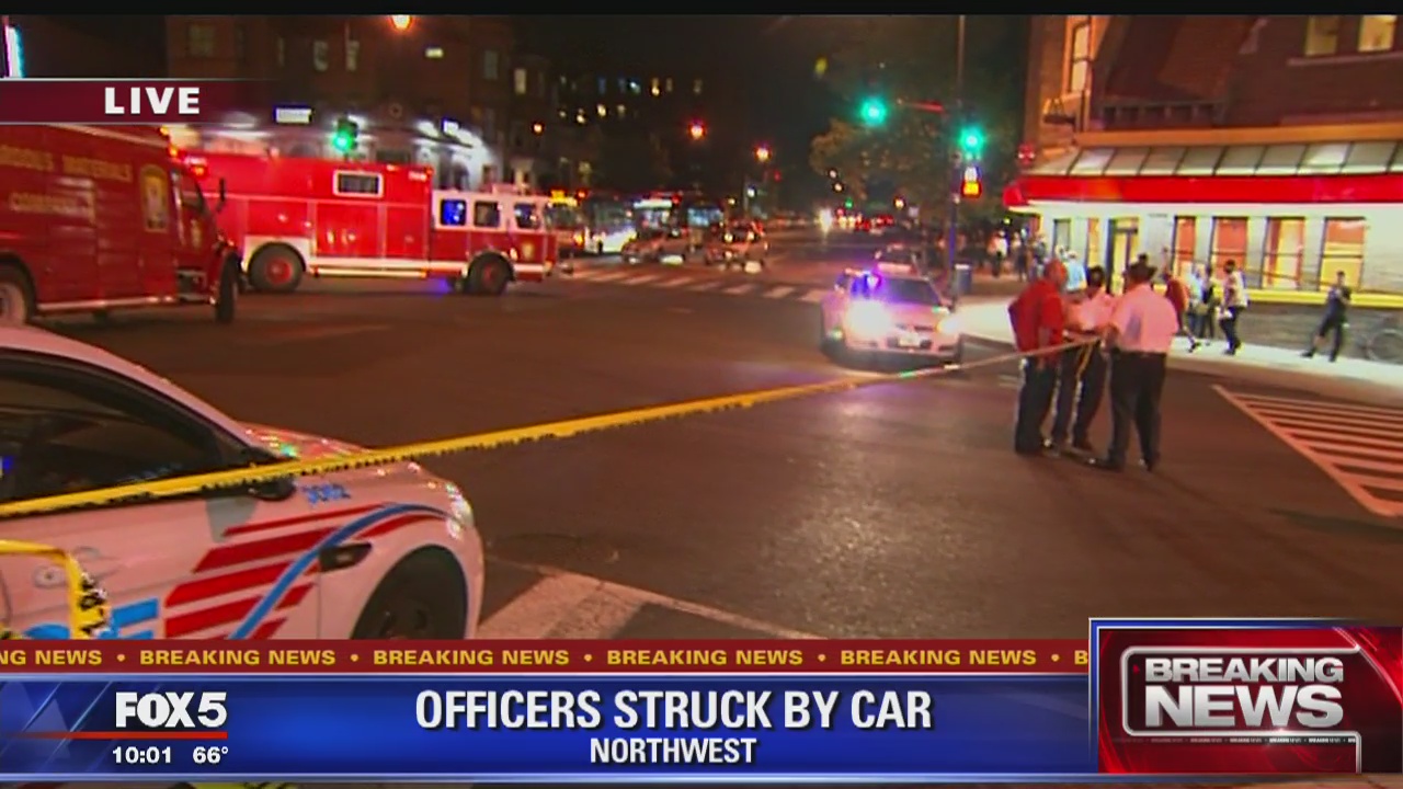 2 DC police officers, DPW employee struck by pickup truck