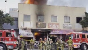 LAFD firefighters battle blaze at textile businesses