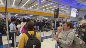 Thanksgiving travelers brace for busy airports and roads
