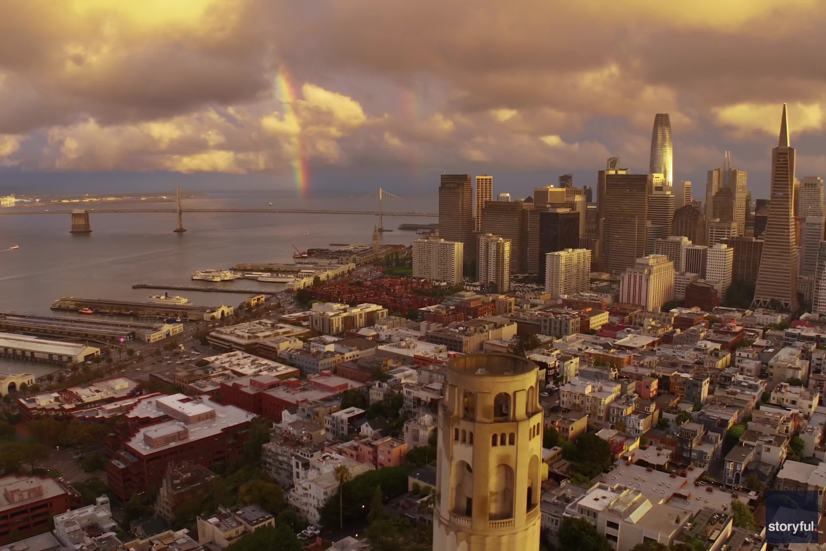 Double rainbow peeks through clouds over San Francisco's during storm