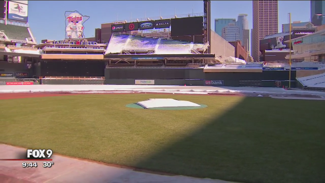 Blankets coming off the grass at Target Field