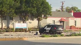 Officer critically hurt, woman killed in pursuit crash