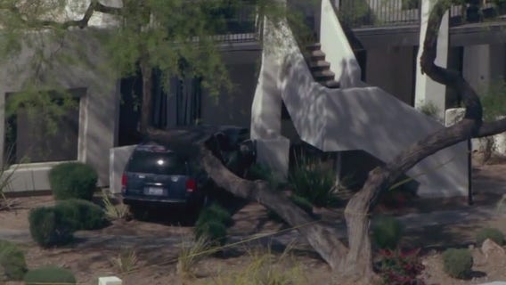 Car crashes into apartment, leaving 2 people injured