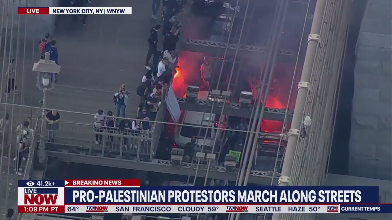 Protesters storm Brooklyn Bridge, flares ignited