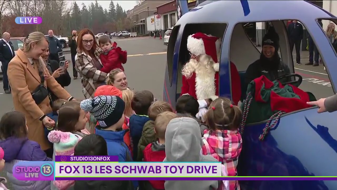 Santa arrives at the FOX 13 Les Schwab Toy Drive
