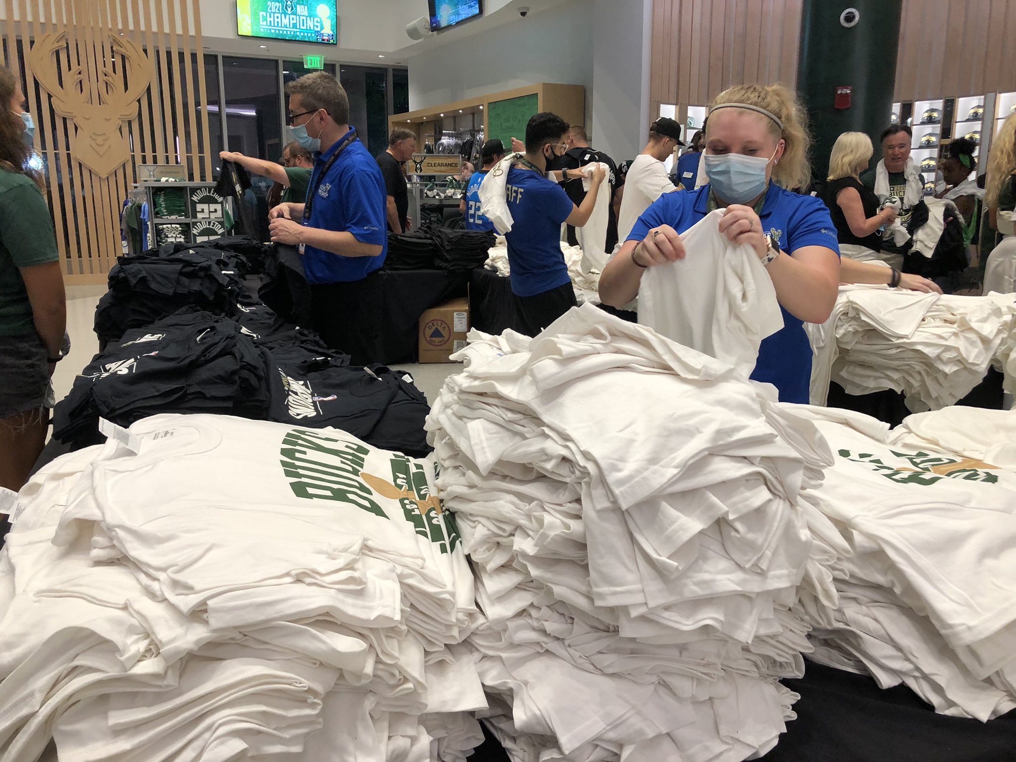 Fans grab Bucks championship gear at Deer District Pro Shop