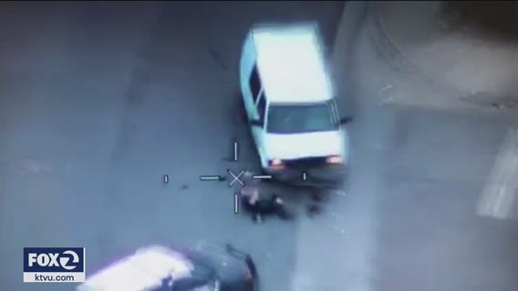 New Video: Standoff suspect slams into police cruisers