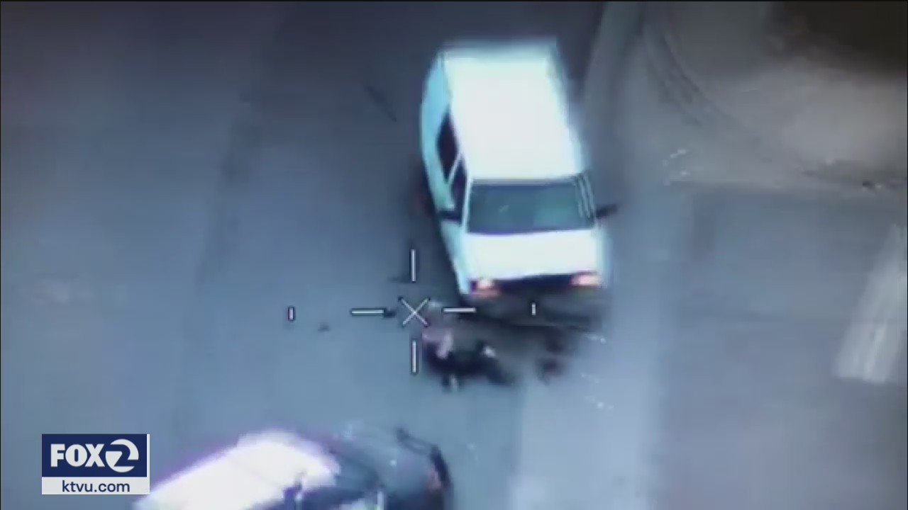 New Video: Standoff suspect slams into police cruisers