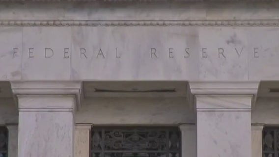 Fed holds interest rates steady to end 2023
