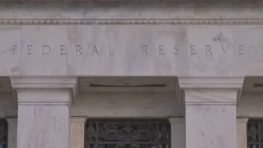 Fed holds interest rates steady to end 2023