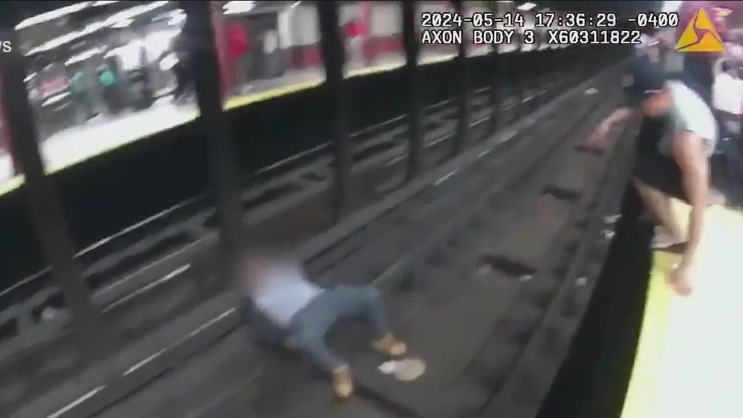 Officers save man who fell onto subway tracks