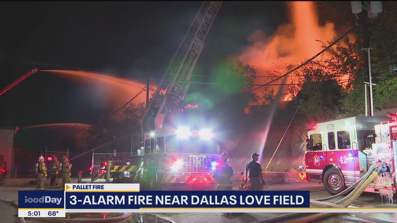 Large pallet fire south of Dallas Love FIeld