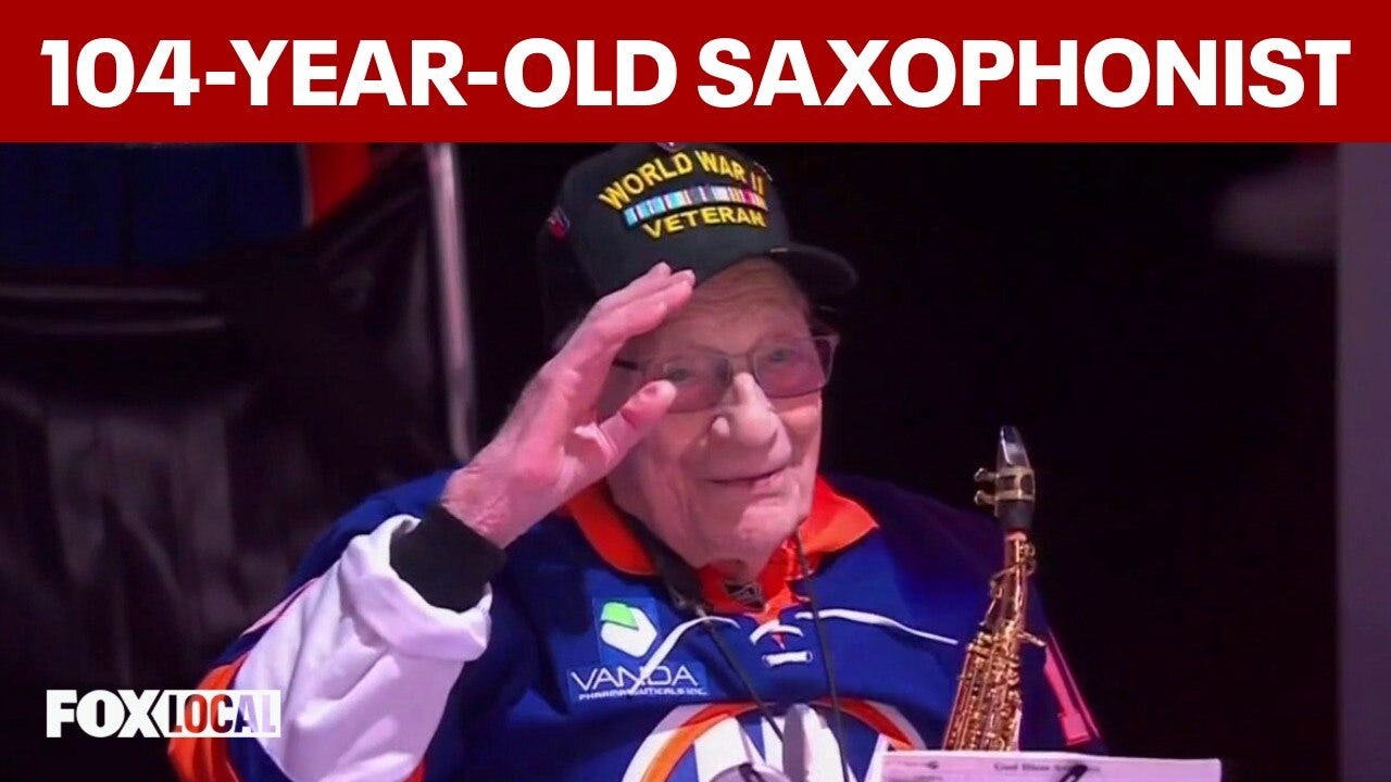 104-year-old WWII veteran performs saxophone national anthem at Islanders-Rangers game