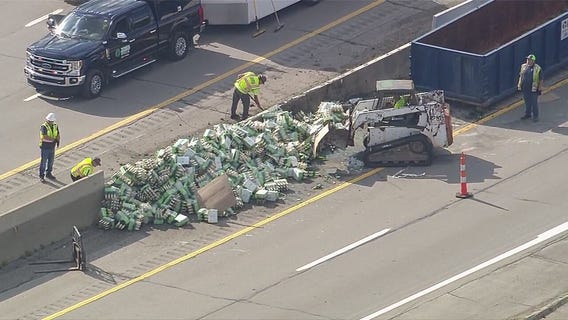 SkyFOX flies over truck crash, massive bottle spill on I-94