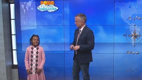 Brooklyn helps Rob with the weather