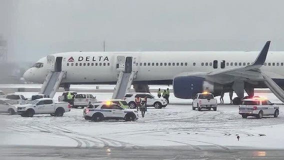 More than 200 passengers evacuate Delta flight, 4 people hurt