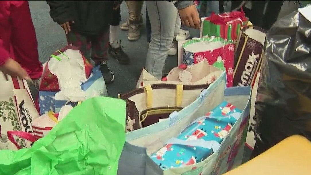 Local foundation donates dozens of gifts to needy students for holidays