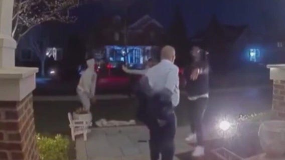 Chicago area couple robbed at gunpoint in front of their home