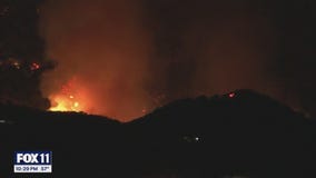 Chopper nails water drop over Palisades fire