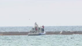 Police search for woman's body after deadly boat wreck on Lake Michigan