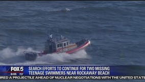 Search resumes for missing swimmers