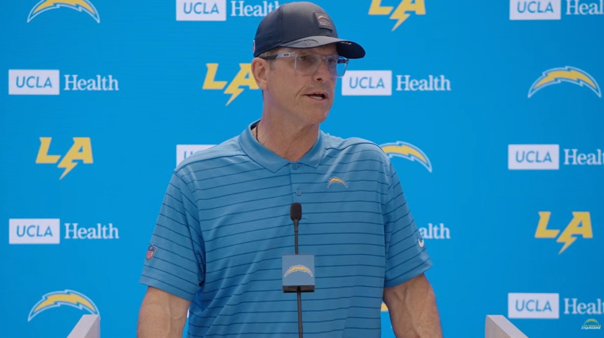 Former Michigan coach Jim Harbaugh reacts to Sherrone Moore firing