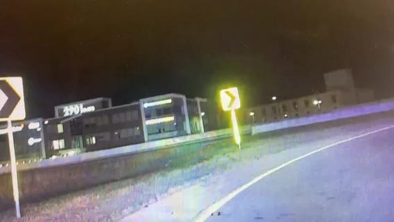 Police dashcam video shows Indiana driver crash into retention pond