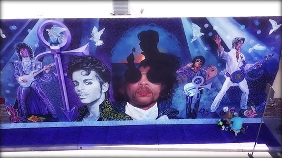 Artist almost done with mural painted in memory of Prince