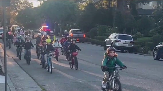 Piedmont kids ride bikes together after AC transit bus route eliminated