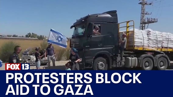 Protesters attempt to block humanitarian aid to Gaza