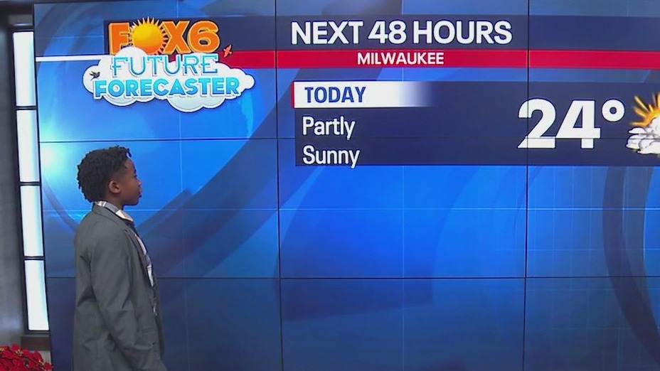 Zaire helps Rob with the weather