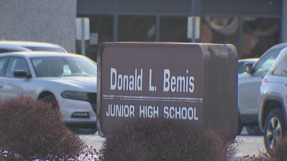 Man accused of driving into people outside school